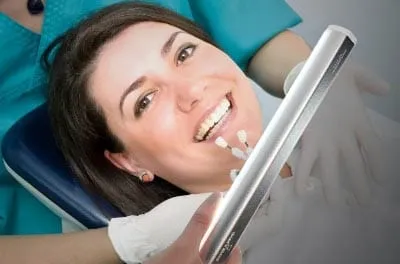 2017 Shade Wand pic woman-lying-in-a-dental-chair Shade Wand - Dental Chair